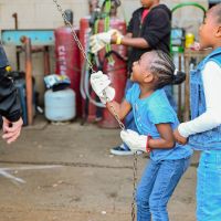 Two middle school students working at hands-on leaning site Two middle school students working at hands-on leaning site